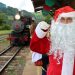 Papai Noel recepciona turistas na Estação Ferroviária  de Marcelino Ramos